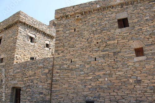 Beautiful daytime view of the historical ruins of Thee Ain (Zee Ain or Dhee Ain) Ancient Village in Al Bahah, Saudi Arabia. This place is also known as the historical Marble Village. photo