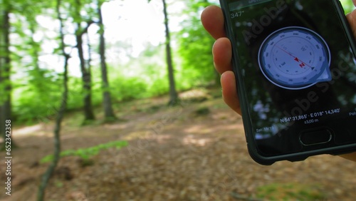 Navigating in Forest with GPS Compass Application on Smartphone POV