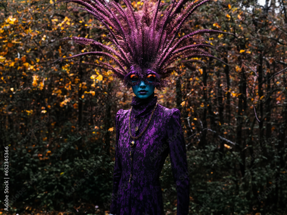 tall creature living in the purple forest