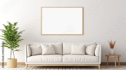 Empty frame on wall over sofa in living room as mockup template