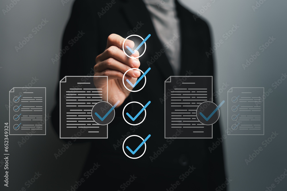 © Ticha - Smart checklist document management certificate and quality control concept, Businesswomen mark on checklist box database and process automation to efficiently manage files Standardization of product © Ticha - Smart checklist document management certificate and quality control concept, Businesswomen mark on checklist box database and process automation to efficiently manage files Standardization of product