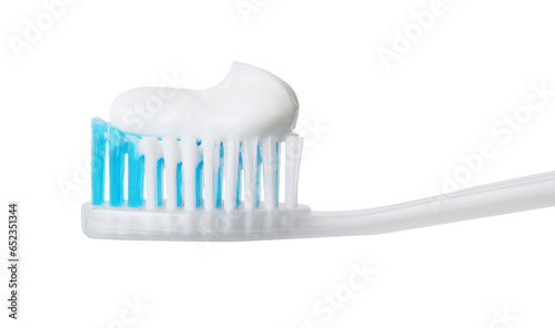 Plastic toothbrush with paste on white background, closeup