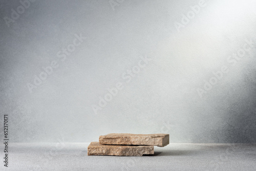 Stone podium as background for cosmetic products