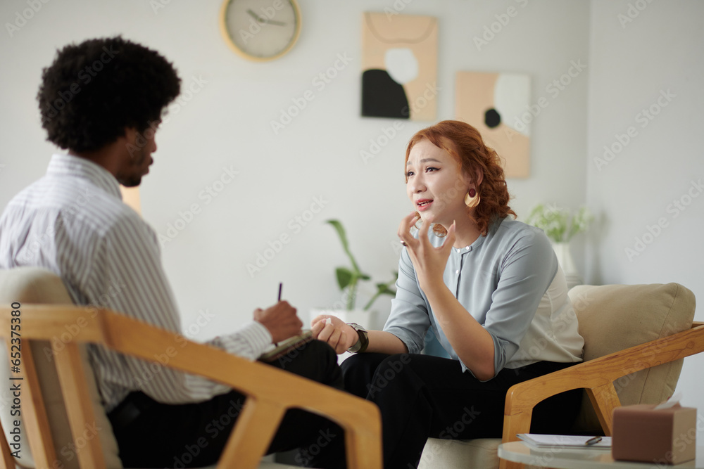 Woman in hysterics talking to