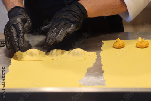 processing and preparation of pumpkin tortelli tradition of Mantua- photo