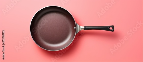 Birds eye view of an isolated frying pan isolated pastel background Copy space