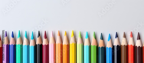 Various colored pencils for artistic drawing materials isolated pastel background Copy space