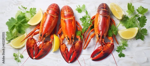 Three lobsters on a white t...