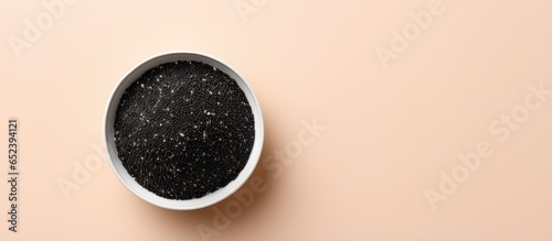 Black cumin isolated on a isolated pastel background Copy space photo