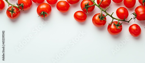 Juicy organic red cherry tomatoes on a isolated pastel background Copy space representing clean eating concept