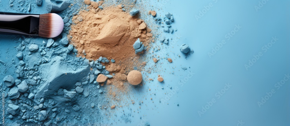 blue eyeshadows and makeup brush isolated pastel background Copy space - obrazy, fototapety, plakaty 