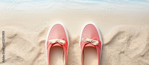 Pictures of womens red beach shoes taken in a studio with a isolated pastel background Copy space