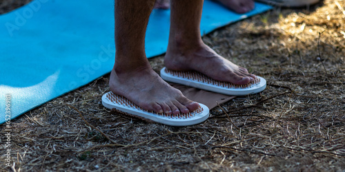 Feet on sharp nails sadhu board