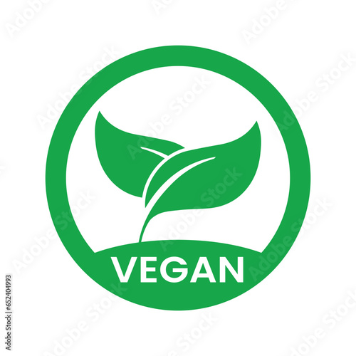 Vegan icon vector. Organic, bio, eco symbol. Vegan, no meat, lactose free, healthy, fresh and non-violent food. Green round vector illustration with leaves for stickers, labels and logos