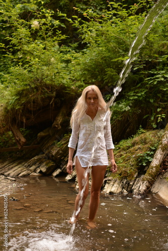 Girl near the waterfall