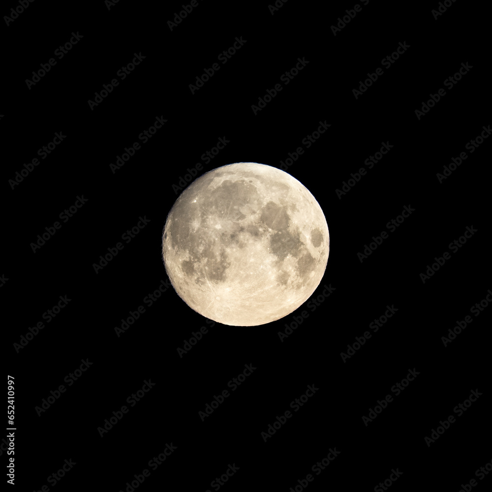 Detailed image of the full moon isolated on black. Detailed image of the full moon isolated on black.