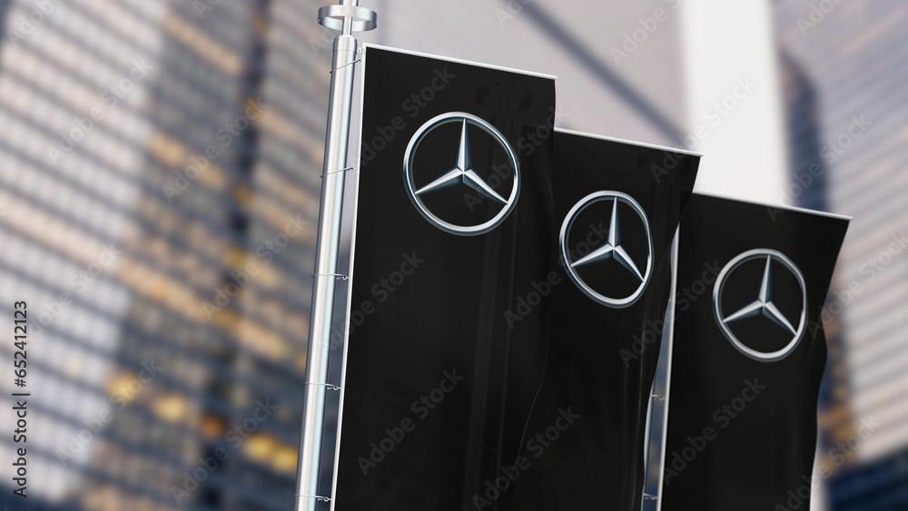 Three black vertical banners with Mercedes logo waving in the wind