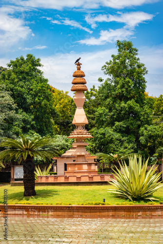 artistic jain red stone holy pillar at morning from unique angle photo