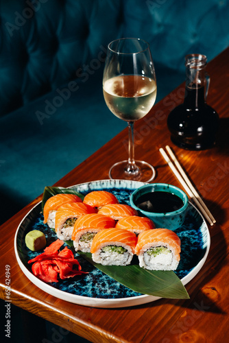 sushi rolls for advertising in an expensive restaurant on blue plates