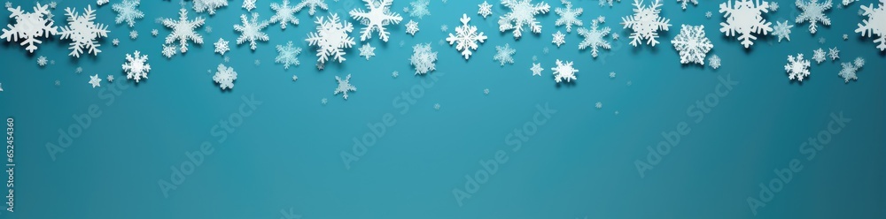 Fototapeta premium A blue background with white snowflakes