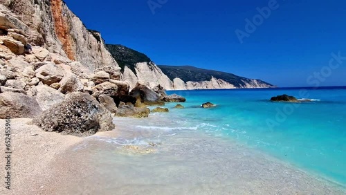 Greece best beaches of Ionian islands. Cephalonia (Kefalonia)- scenic desrted beach Fteris with tropical turquoise sea and white pebbles 4k HD video photo