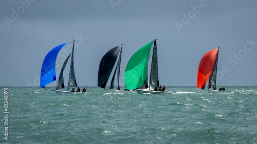 Canvas Print Colourful Gennaker Sails on Yachts Racing in Dublin Bay