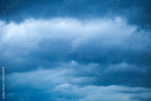 Sky in cloudy weather and rainy dark blue heavy clouds, background