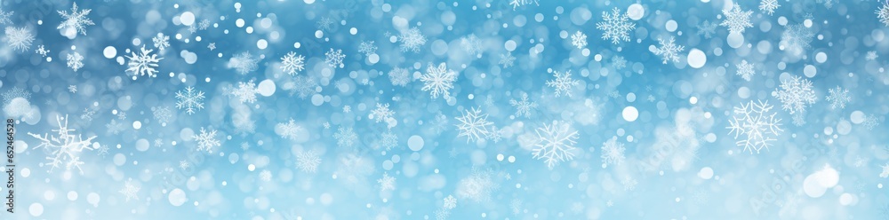 Snowflakes falling on a blue background