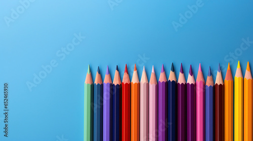 colored pencils background with empty copy space