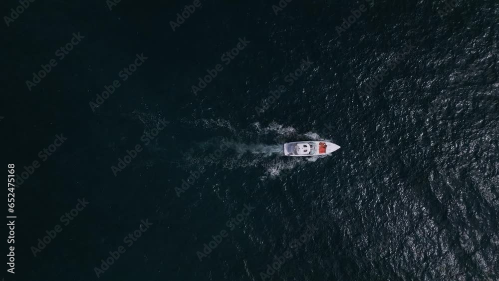 custom made wallpaper toronto digitalAerial view of a pleasure boat racing through the sea waves, creating a mesmerizing picture of speed and freedom.