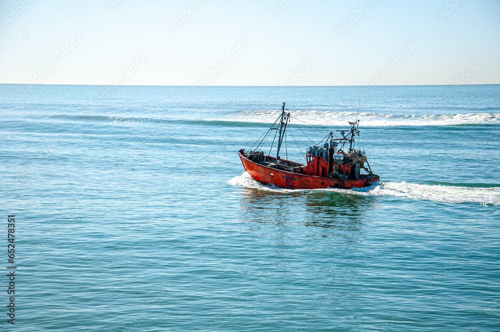 Trawler fishing vessel, leaving the Port of Mar del Plata, Argentina. Trawler fishing vessel, leaving the Port of Mar del Plata, Argentina.