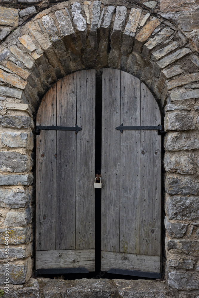 Old wooden door in wall