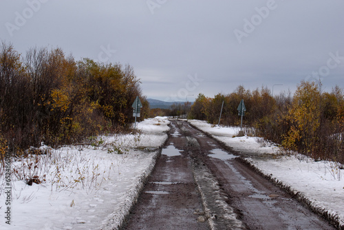 A gravel road in Kiruna, Swedish Lapland next to the Airport. photo