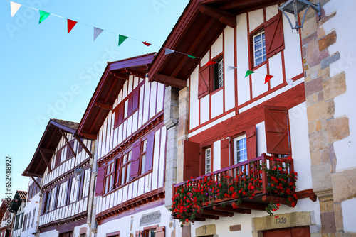 Traditional and colorful half-timbered houses in the old town of Ainhoa photo