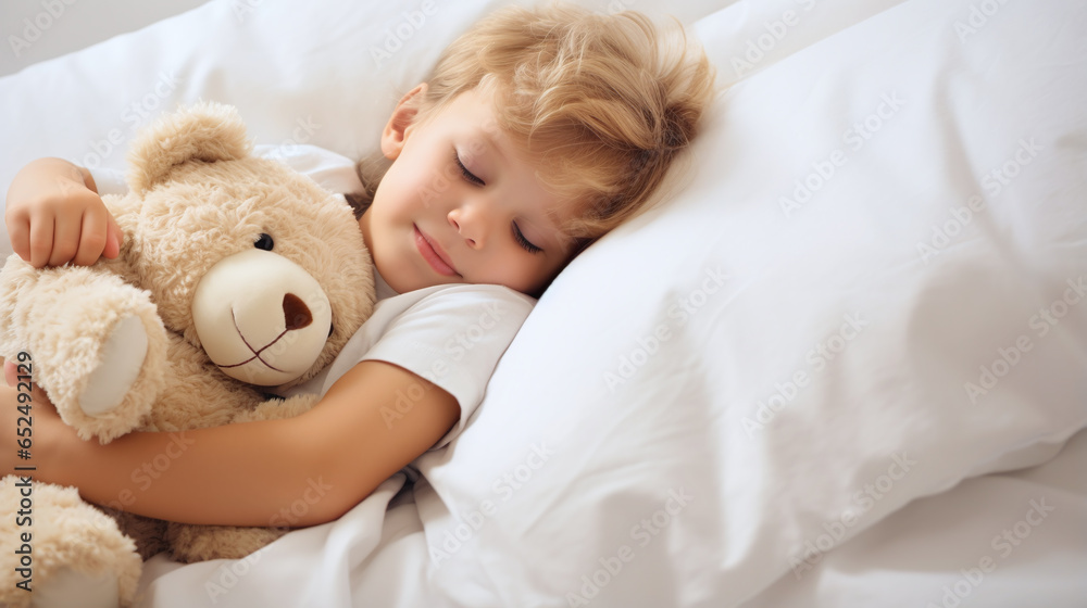 child sleeps peacefully in his cot, snuggled up to his teddy bear child sleeps peacefully in his cot, snuggled up to his teddy bear