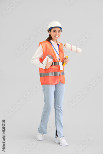 Female decorator with paint...