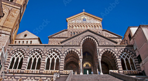 Amalfi Coast Italy Piazza del Duomo Cathedral Steps Exterior Medieval Roman Catholic Summer Blue Sky Ancient relic holiday vacation destination photo