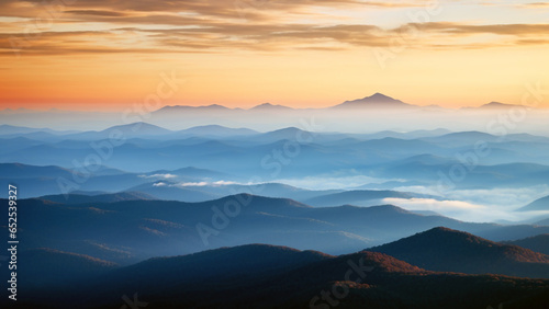 Mountains in silhouette with shadows of blue hues