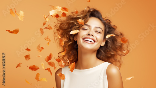 Beautiful young hispanic woman with autumn leaves