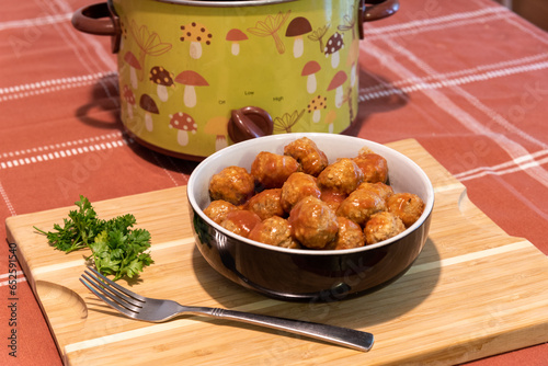 slow cooker crock pot meatballs in bowl on table