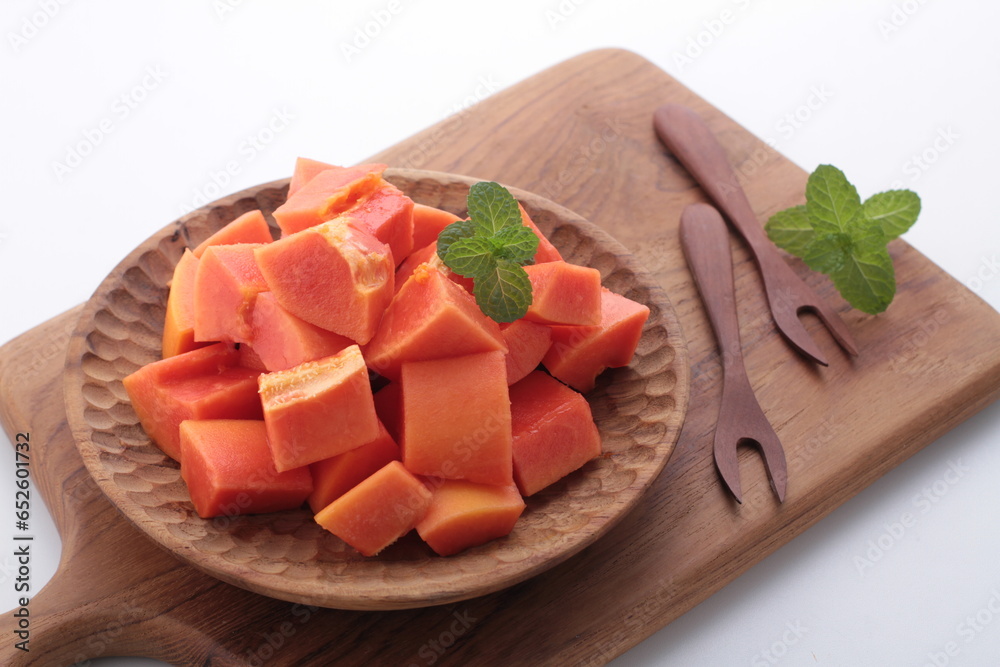 ripe and sweet papaya fruit on gray background ripe and sweet papaya fruit on gray background