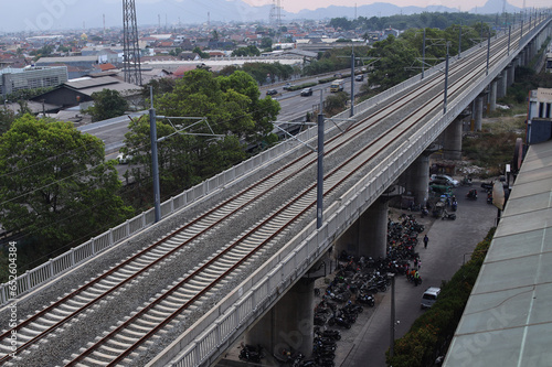 Bandung, Indonesia - 24 September 2023: Aerial view railroad tracks for Kereta Cepat Jakarta Bandung (KCJB) atau Comprehensive Inspection Train (CIT)  photo