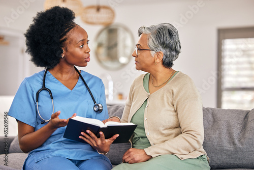 Fotografija Bible, religion and assisted living caregiver with an old woman in a retirement home together