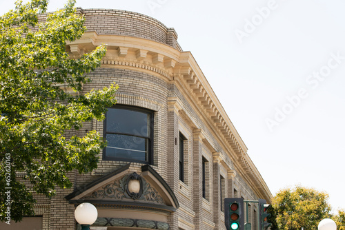 Lodi, California, USA - July 16, 2021: Sunlight shines on the historic downtown buildings of Lodi. photo