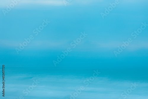 Blue ocean colours on a cloudy afternoon