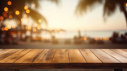 Wooden table and blur beach cafes background.
