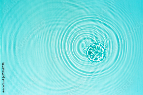 Pattern of circles on clear water from drops
