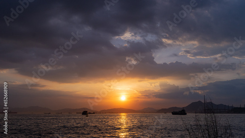 sunset at the sea with aesthetic violet blue orange sky 