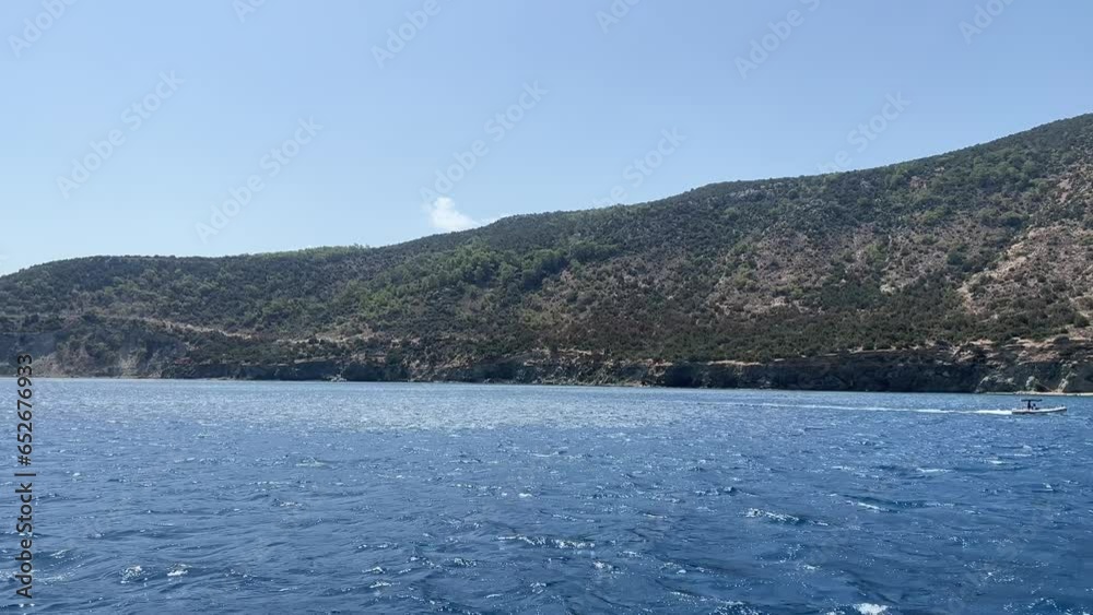 Mediterranean sea in Paphos filmed from boat, up-close establish shot Mediterranean sea in Paphos filmed from boat, up-close establish shot