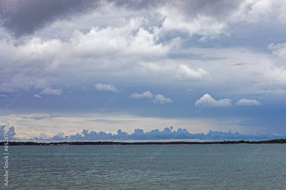 cloudy sky covered with clouds on the sea before a storm